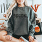 Spooky CC Sweatshirt - Pepper